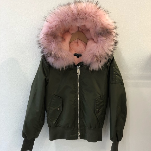 army green jacket with pink fur hood